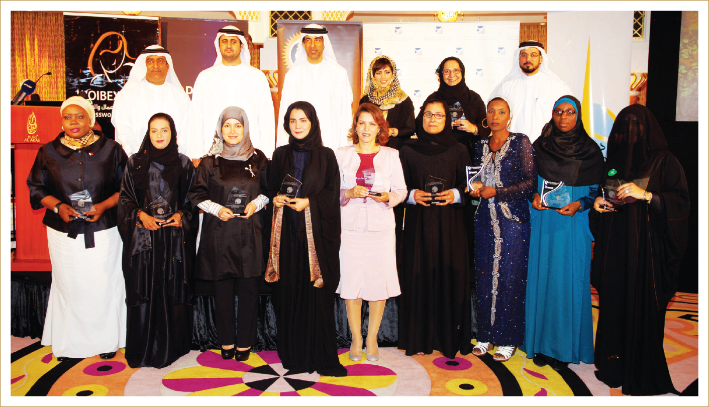 Group photo of dignitaries and honorees at a Middle East excellence awards ceremony